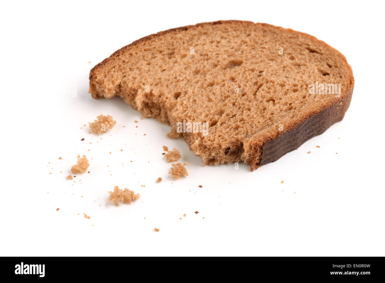 Slice of rye bread and breadcrumbs isolated on white Stock Photo