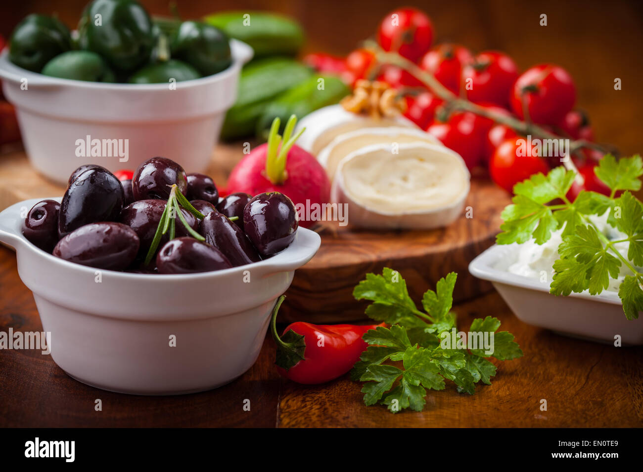 Raw vegetables, yogurt dip and antipasti Stock Photo Alamy