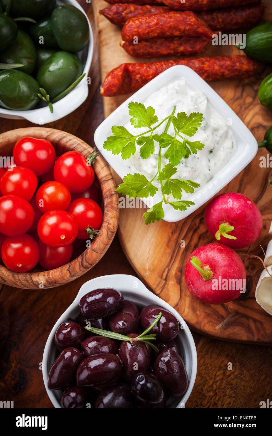 Raw vegetables, yogurt dip and antipasti Stock Photo Alamy