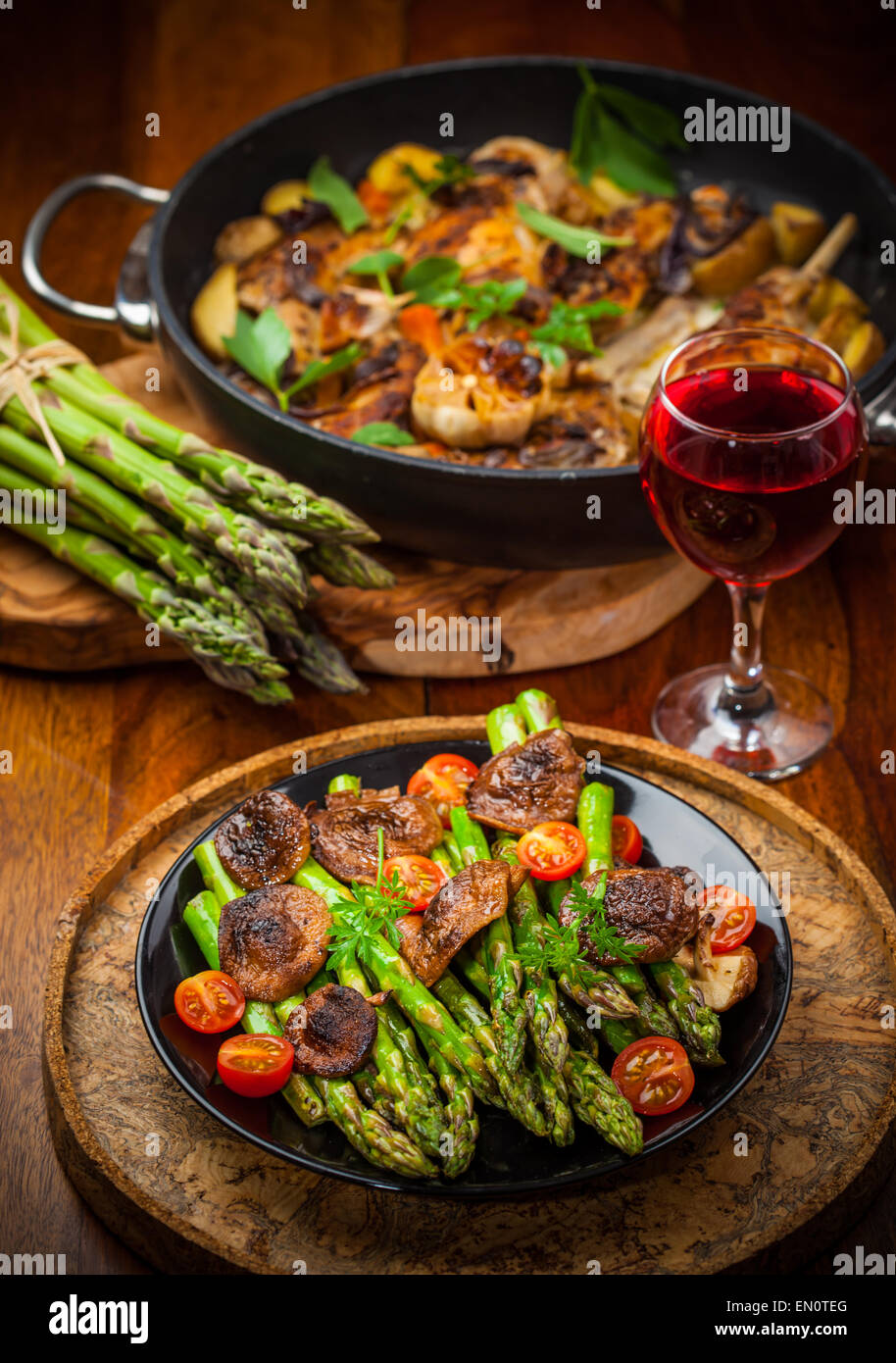 Green asparagus salad with roasted mushrooms and red wine Stock Photo