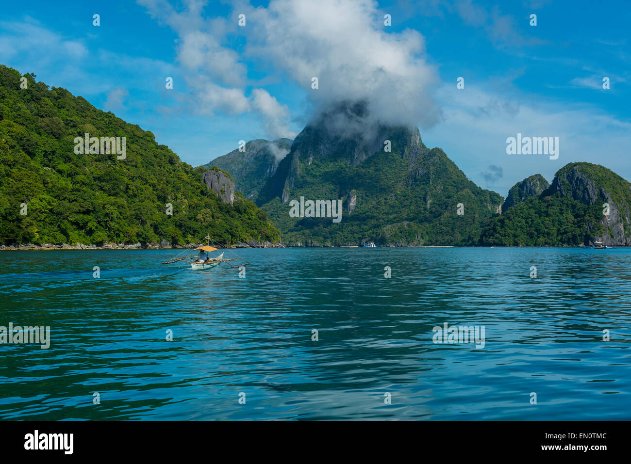 Azure green waters in the beautiful lagoons around El Nido, Palawan, Philippines Stock Photo