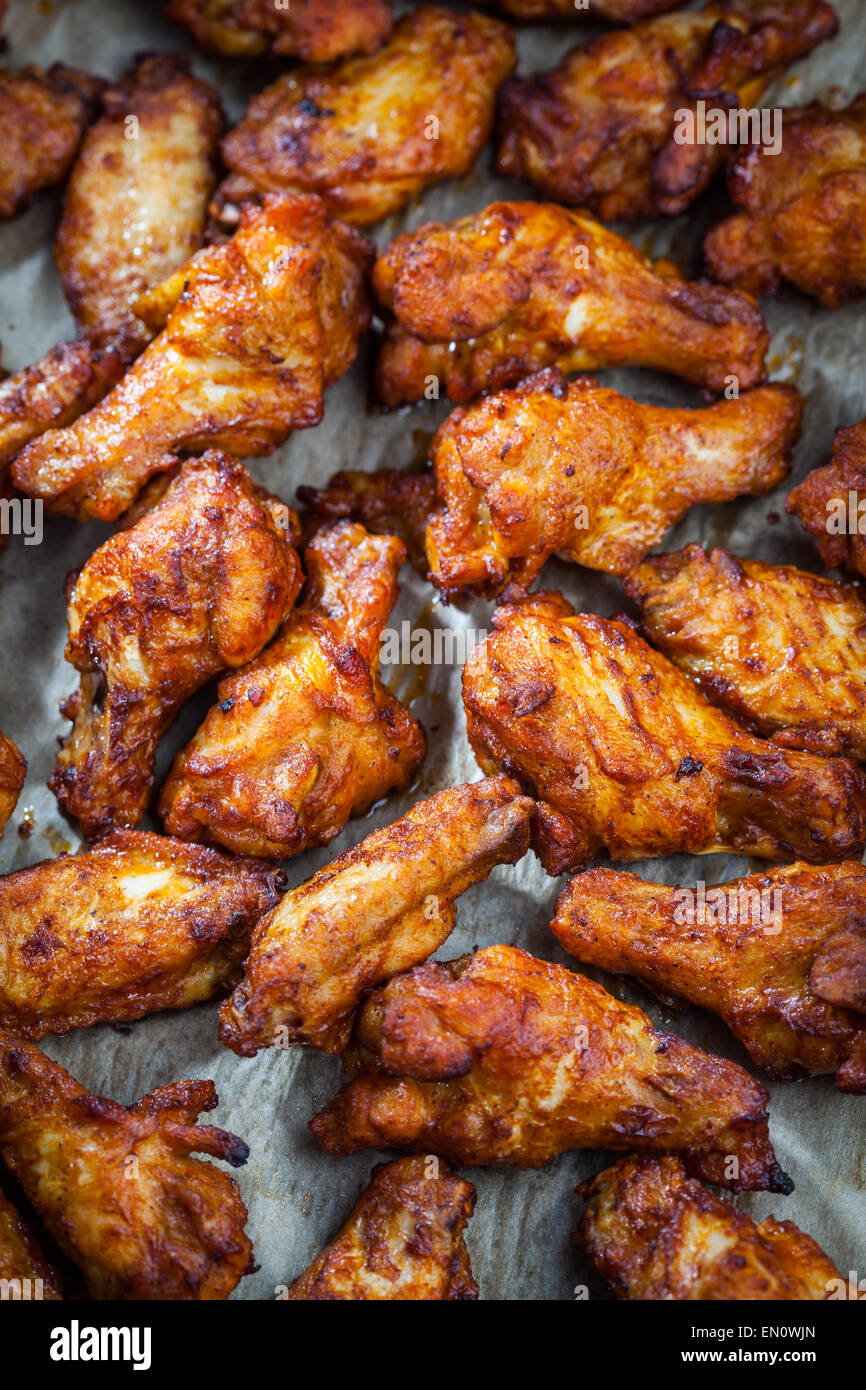 BBQ chicken wings on baking sheet Stock Photo Alamy