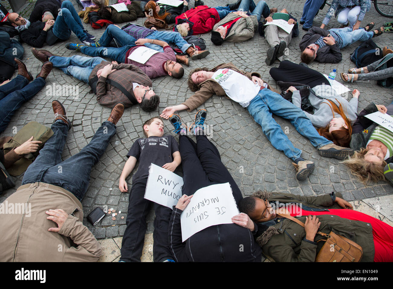 Bristol, UK. 25th Apr, 2015. Campaigners in Bristol City centre held a 'die-in' to show support for migrants after the recent deaths of hundreds of migrants crossing the Mediterranean. Bristol, UK. 25th April 2015. Credit:  Redorbital Photography/Alamy Live News Stock Photo