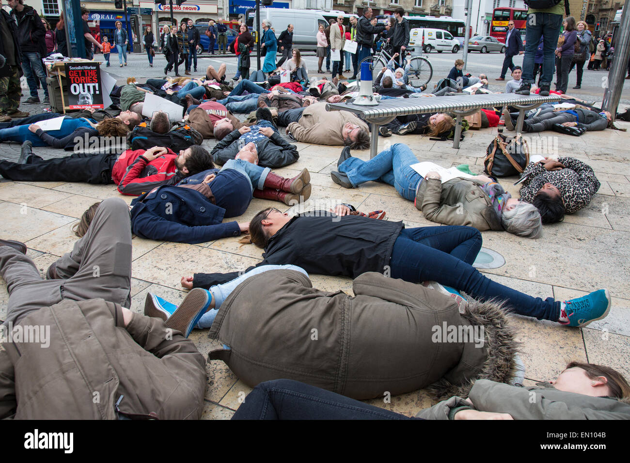 Bristol, UK. 25th Apr, 2015. Campaigners in Bristol City centre held a 'die-in' to show support for migrants after the recent deaths of hundreds of migrants crossing the Mediterranean. Bristol, UK. 25th April 2015. Credit:  Redorbital Photography/Alamy Live News Stock Photo