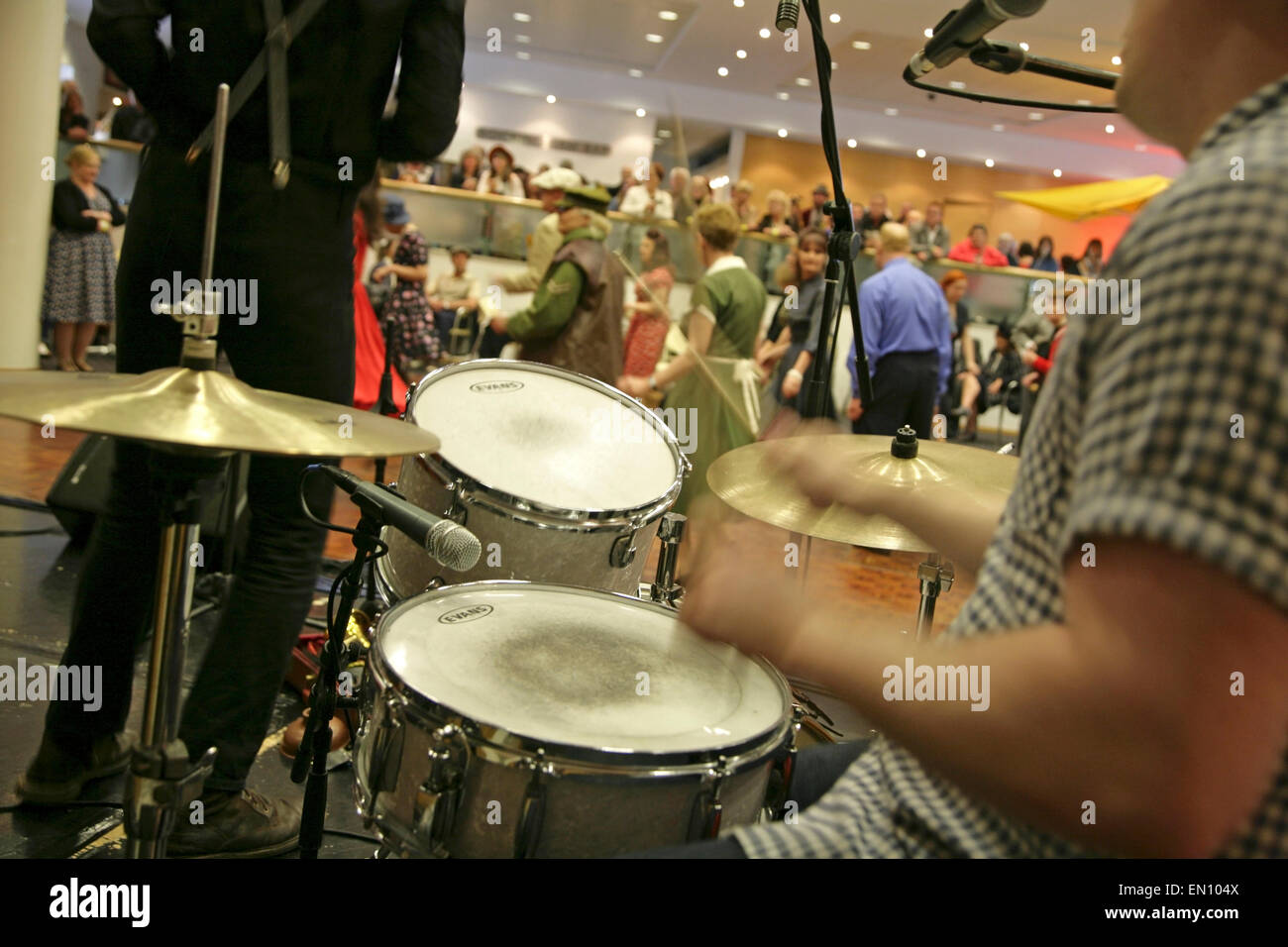York, UK, 25 April 2015. 'The Jive Aces' jive and swing band entertain visitors to the Festival of Vintage at York Racecourse: an event showcasing and celebrating the fashion, beauty, cars, motorcycles, music and lifestyle from the 1930's to 1960's. Credit:  david soulsby/Alamy Live News Stock Photo