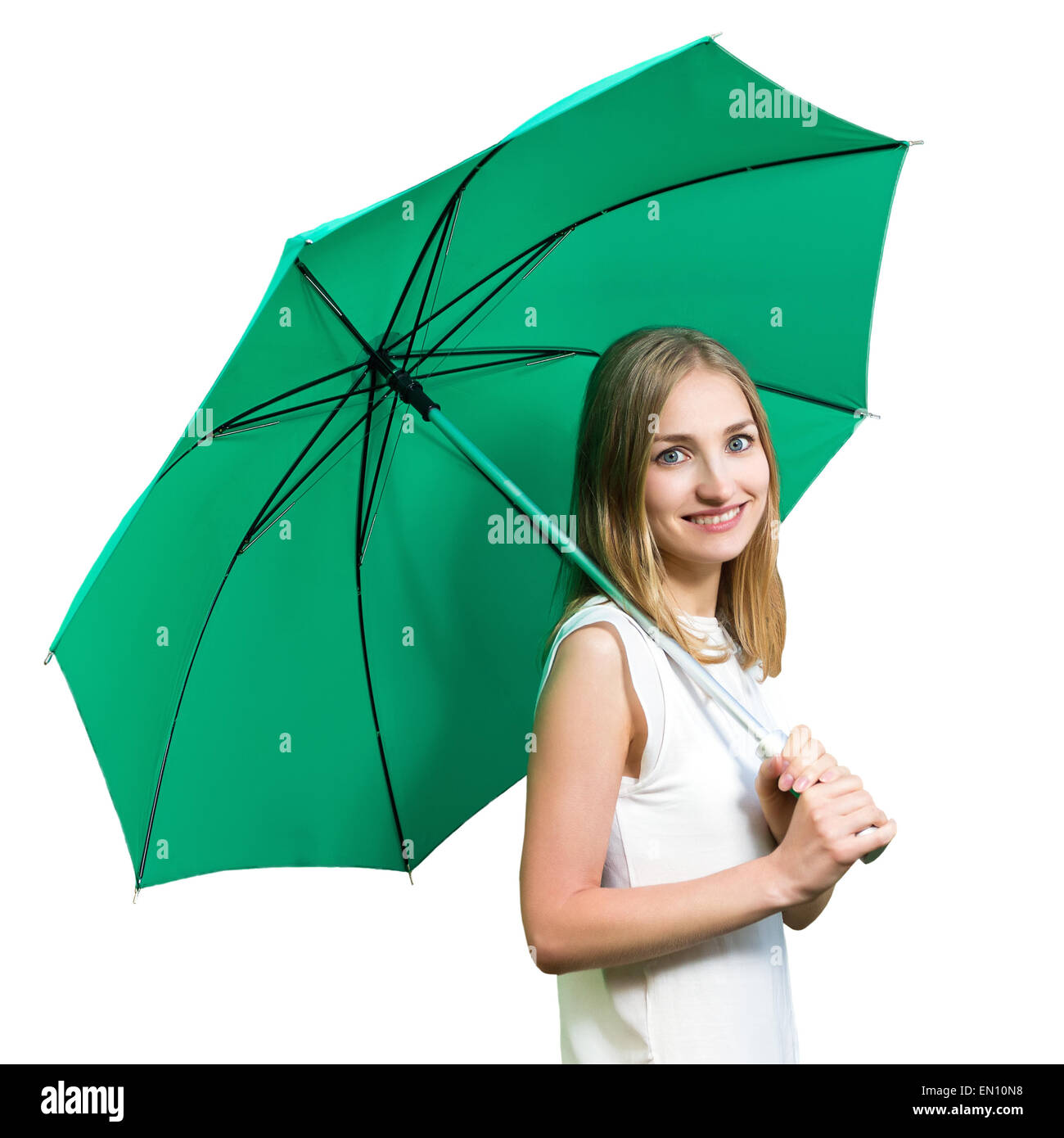 Beautiful smiling girl holding a green umbrella isolated on whit Stock Photo