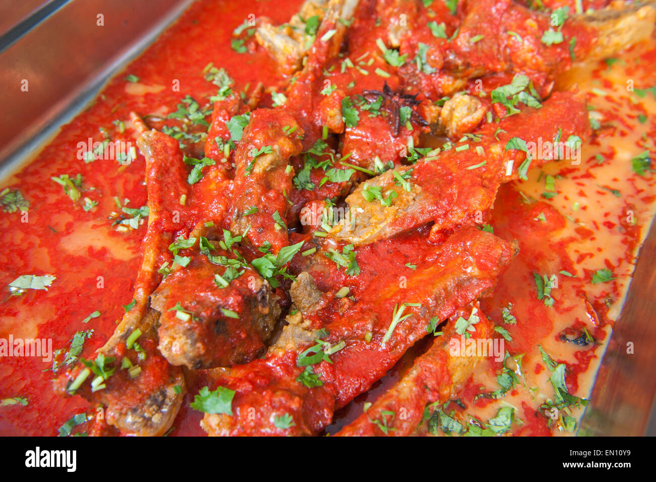 Closeup detail of gosht rogan josh meal on display at an indian restaurant buffet Stock Photo