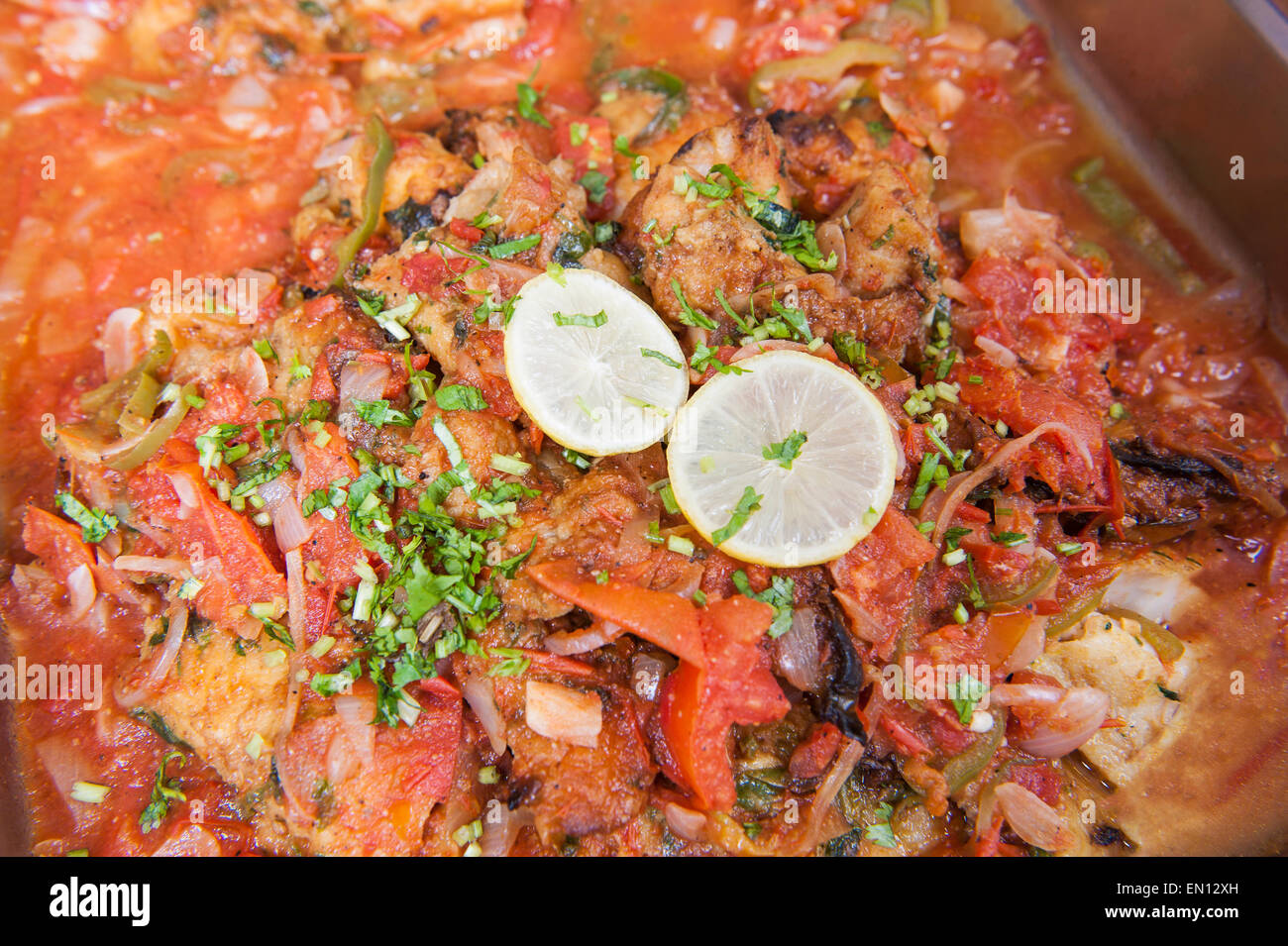 Egyptian fish tagine on display at a restaurant buffet Stock Photo Alamy