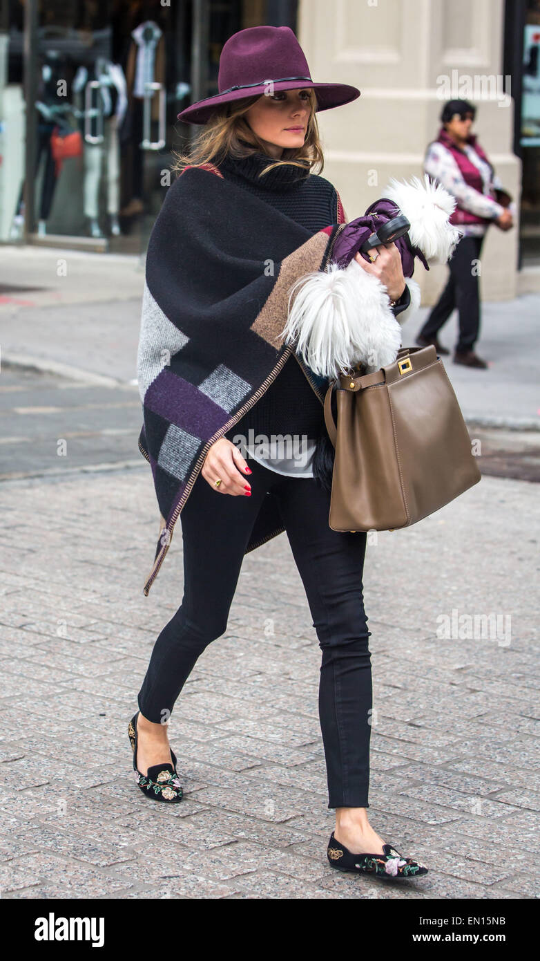 Olivia Palermo, looking stylish wearing a hat and a Burberry colour block  check blanket poncho, running errands in Brooklyn with her dog Mr. Butler  Featuring: Olivia Palermo,Mr. Butler Where: Brooklyn, New York,