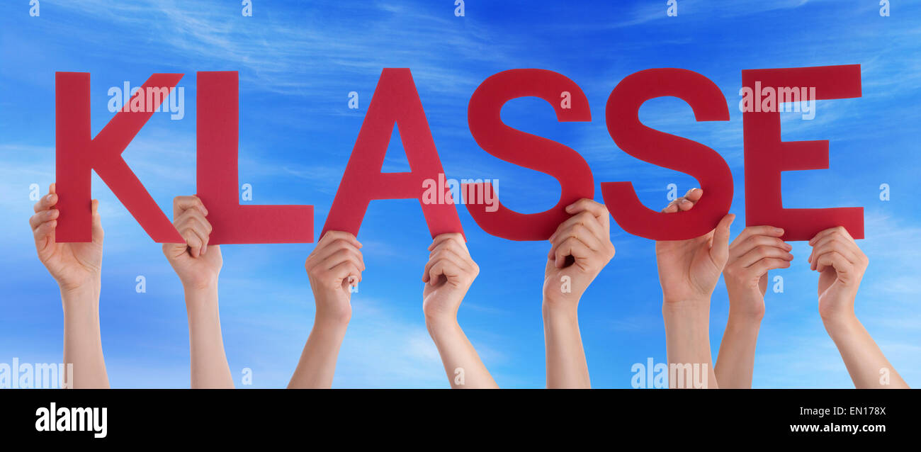 Many Caucasian People And Hands Holding Red Straight Letters Or Characters Building The German Word Klasse Which Means Super Car Stock Photo