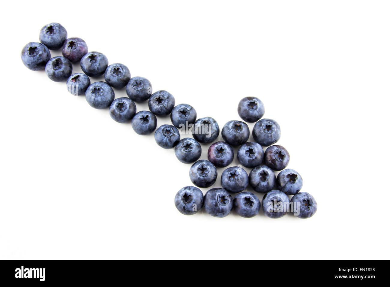 Arrow made of blueberries Stock Photo