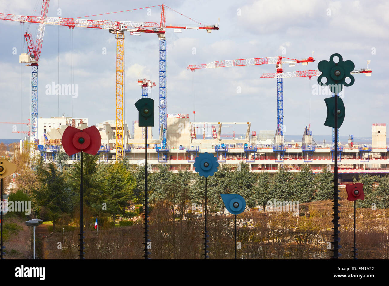 Cranes on a building site and modern art La Defense Paris France Europe Stock Photo