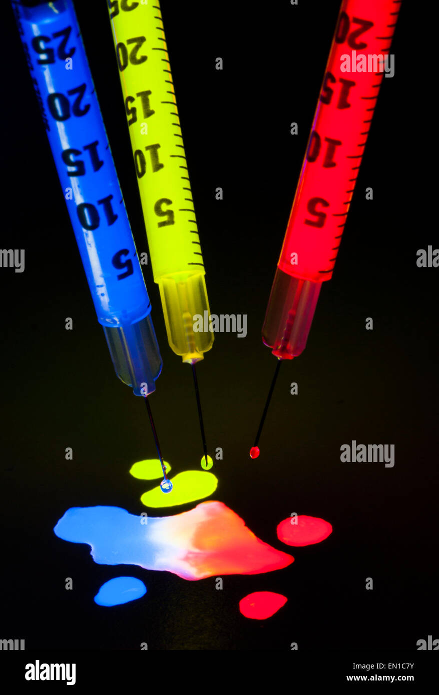 Light Junkie Syringes filled with Glow Stick Juice Stock Photo Alamy