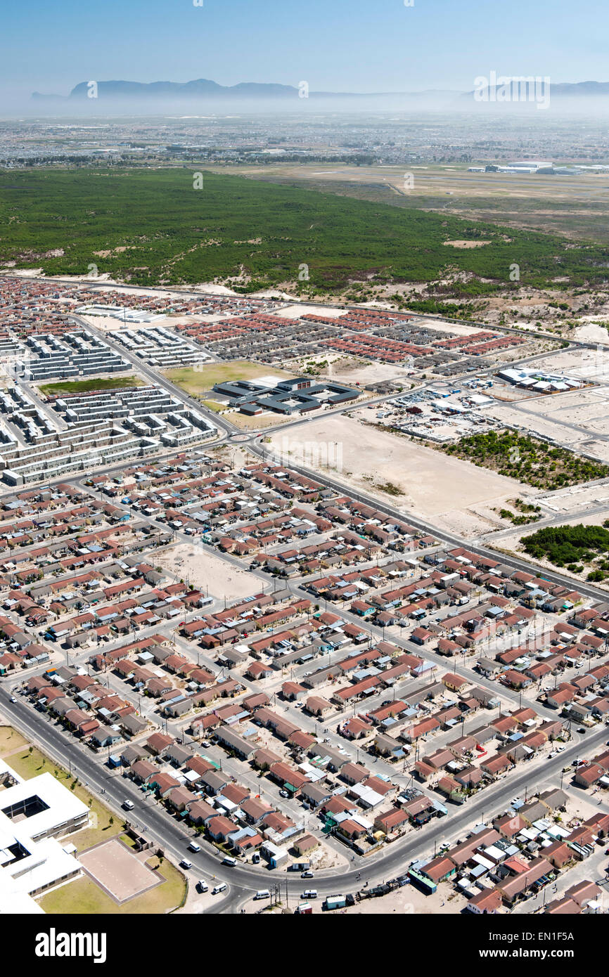 Aerial view of housing and the suburb of Delft in the Cape Flats region of Cape Town, South