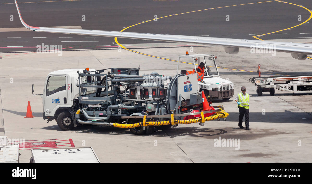 Passenger jet airplane fuel supply truck, airport service, refueling Stock Photo Alamy