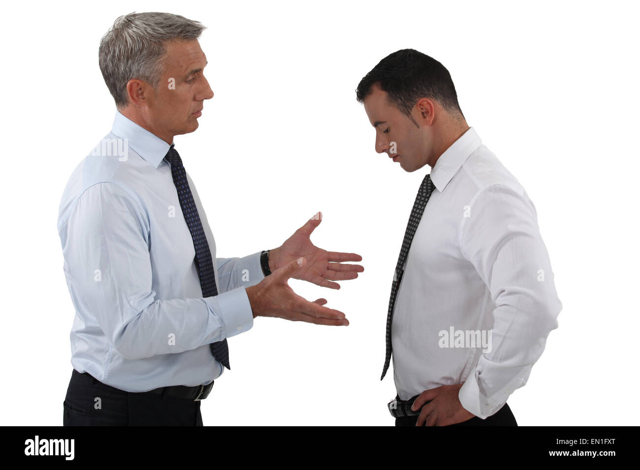 Businessmen having a serious discussion Stock Photo Alamy