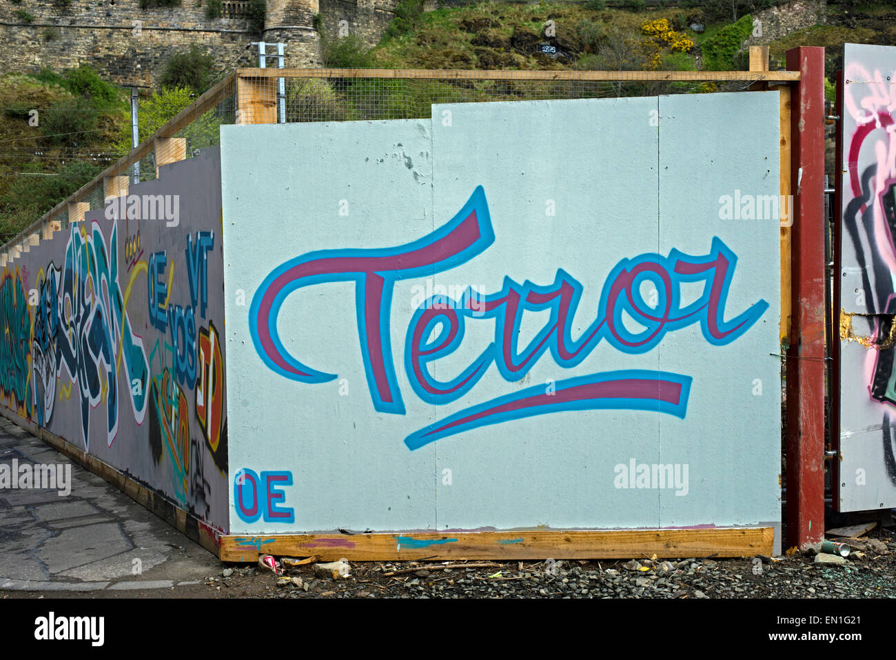 The word "Terror" painted on boards around a building site in the canongate area of Edinburgh. Stock Photo