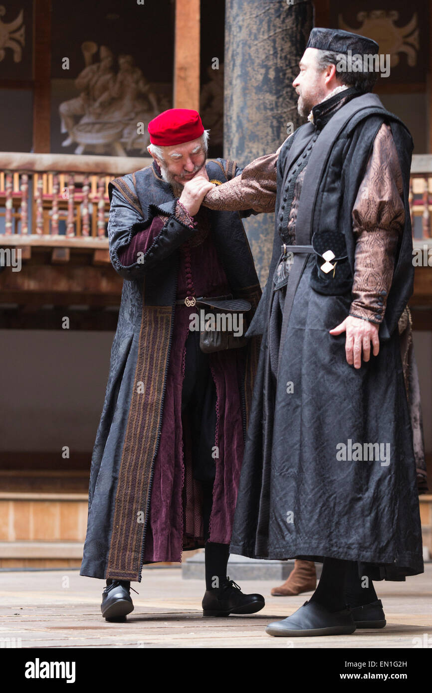 London, UK. 25 April 2015. Jonathan Pryce as Shylock and Dominic Mafham ...