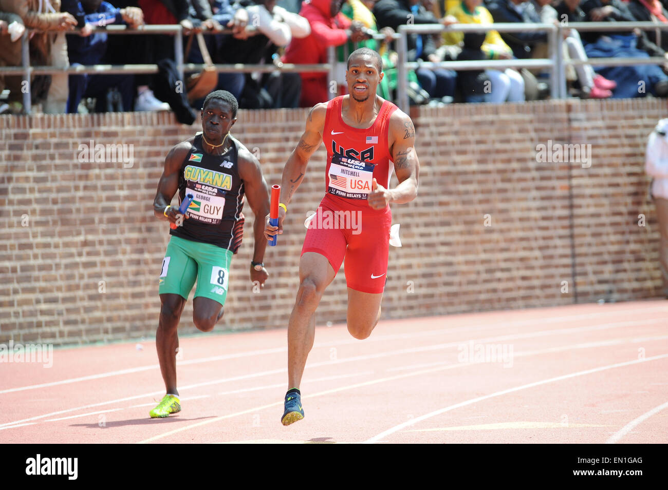 Philadelphia, Pennsylvania, USA. 25th Apr, 2015. Team USA's MAURICE MITCHELL, running against Guyana's WINSTON GEORGE, in the USA vs The World Men 4x200 which was held at the historic Franklin Field in Philadelphia Pa Credit:  Ricky Fitchett/ZUMA Wire/Alamy Live News Stock Photo