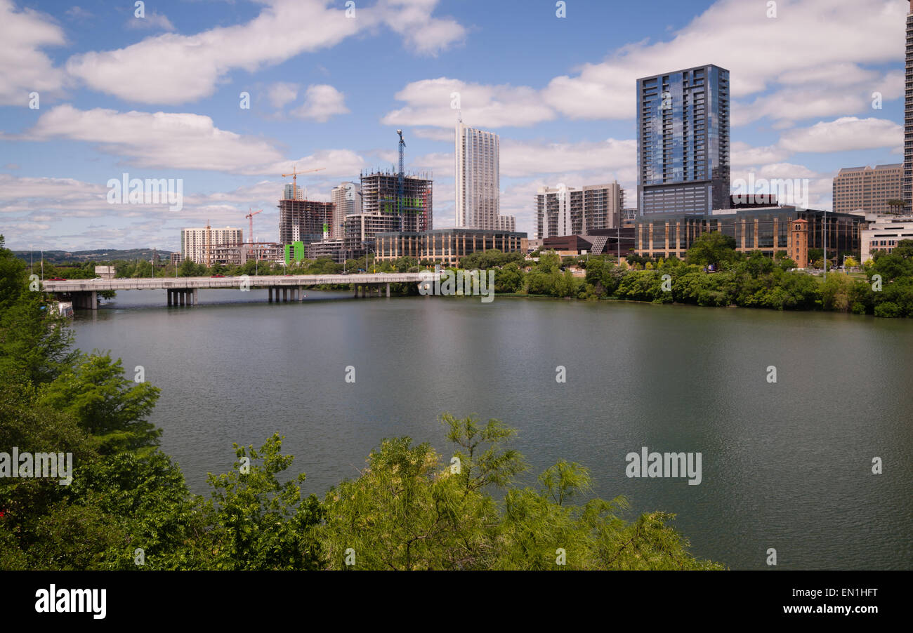 Urban development continues along the river in Downtown Austin, Texas Stock Photo
