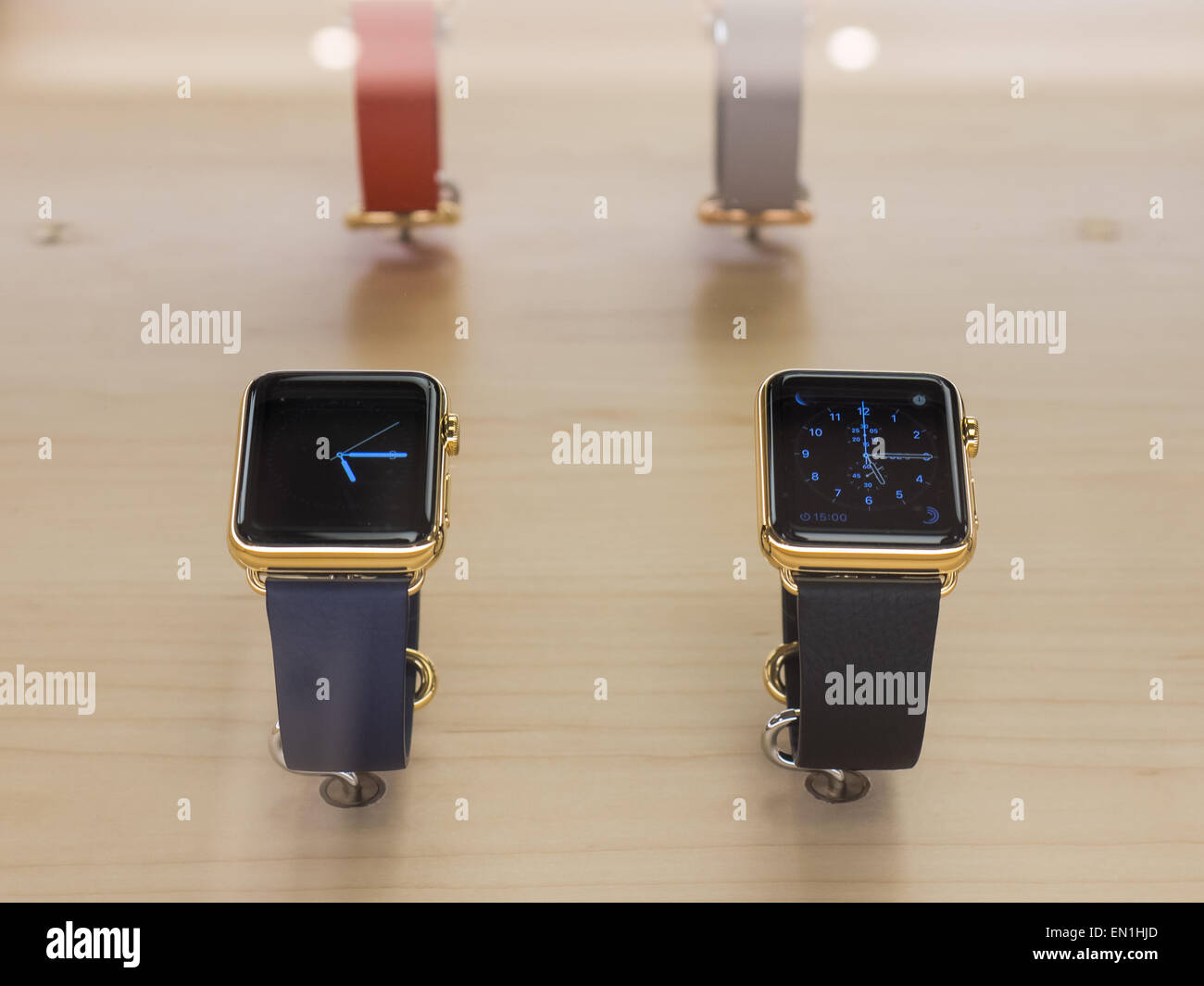 TORONTO, CANADA - APRIL 10, 2015:  A couple of new Apple Watch Edition sit at the retail store. Apple begins the Apple Watch pre-order at the Canadian retail stores this day. Stock Photo