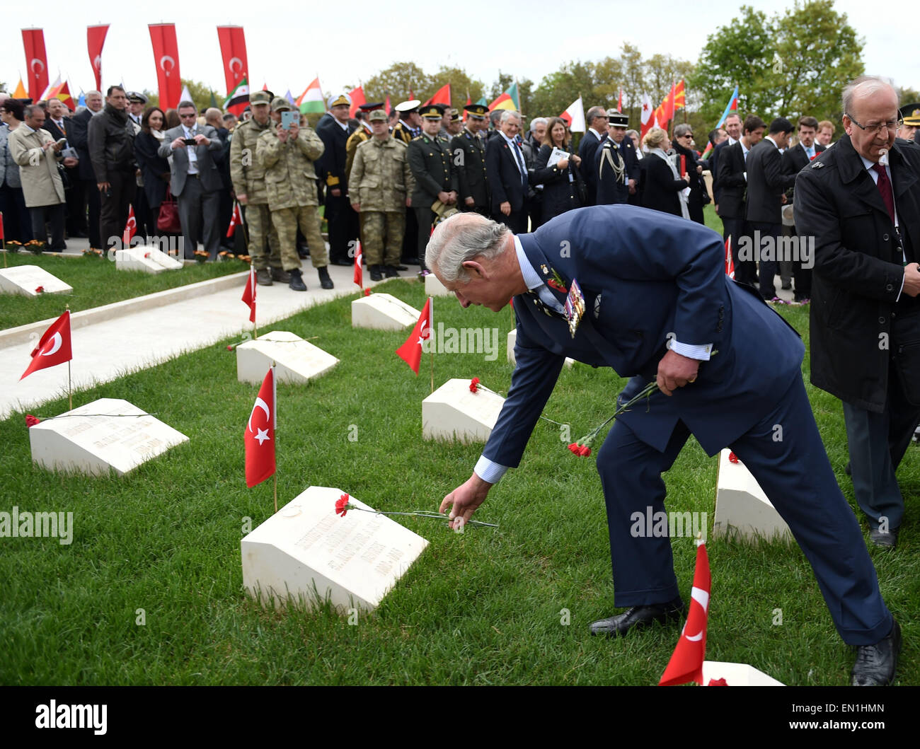 (150425) -- CANAKKALE, April 25, 2015(Xinhua) -- British Prince of Wales Charles presents a flower at the 57th Infantry Regiment Memorial in Canakkale, Turkey, April 25, 2015. Leaders and dignitaries from the UK, Ireland, Australia and New Zealand joined Turkish military delegates to attend Turkish memorial service on Saturday at the 57th Infantry Regiment Memorial, as an event of 100th anniversary of the Gallipoli Battle. (Xinhua/He Canling) Stock Photo