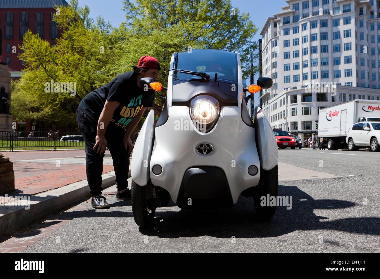 Toyota iRoad concept car (3 wheeled EV) on road Washington, DC USA