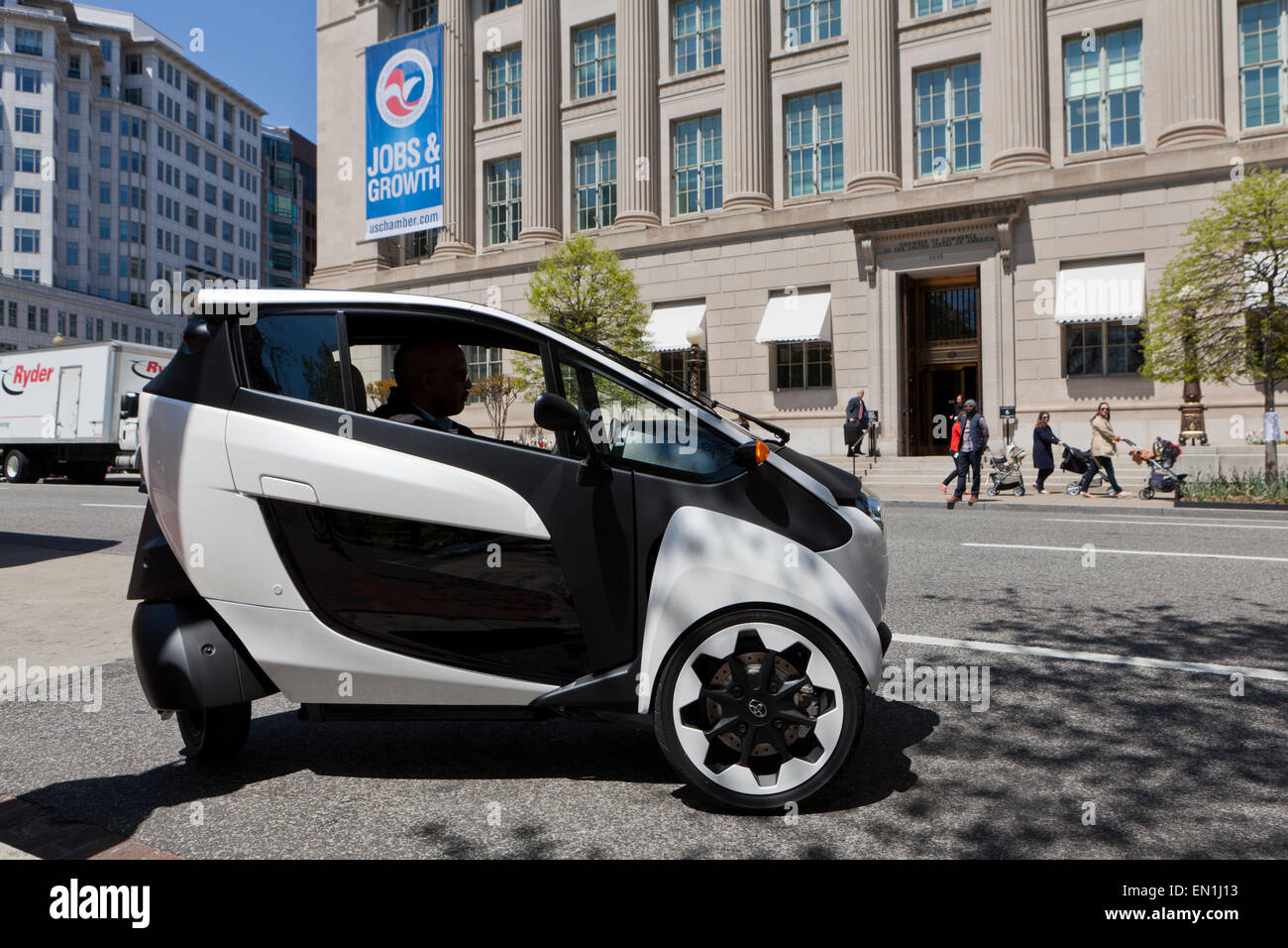 Toyota i Road concept car 3 wheeled EV on road Washington DC