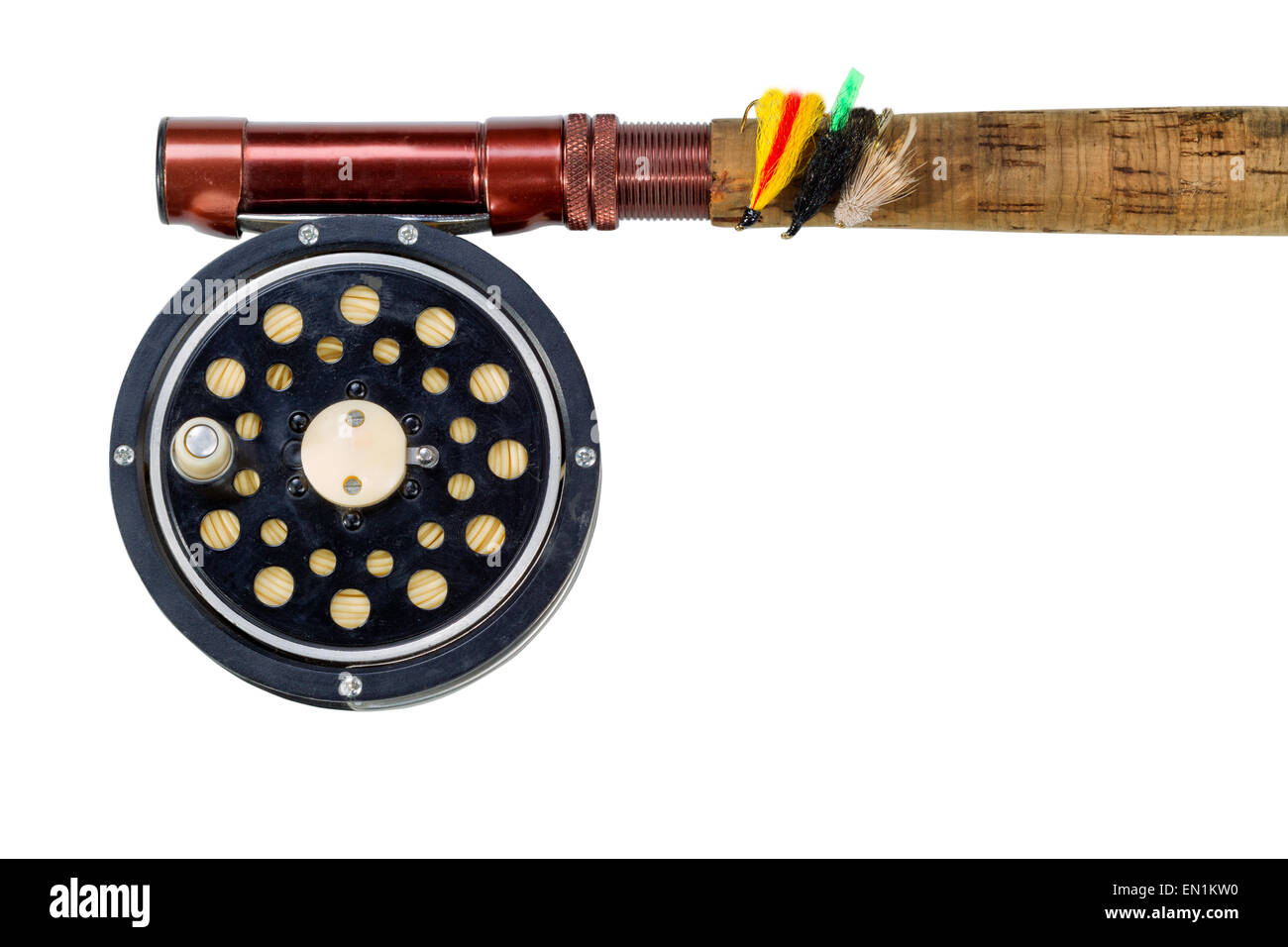 Antique fly fishing reel, flies and rod isolated on white background. Stock Photo
