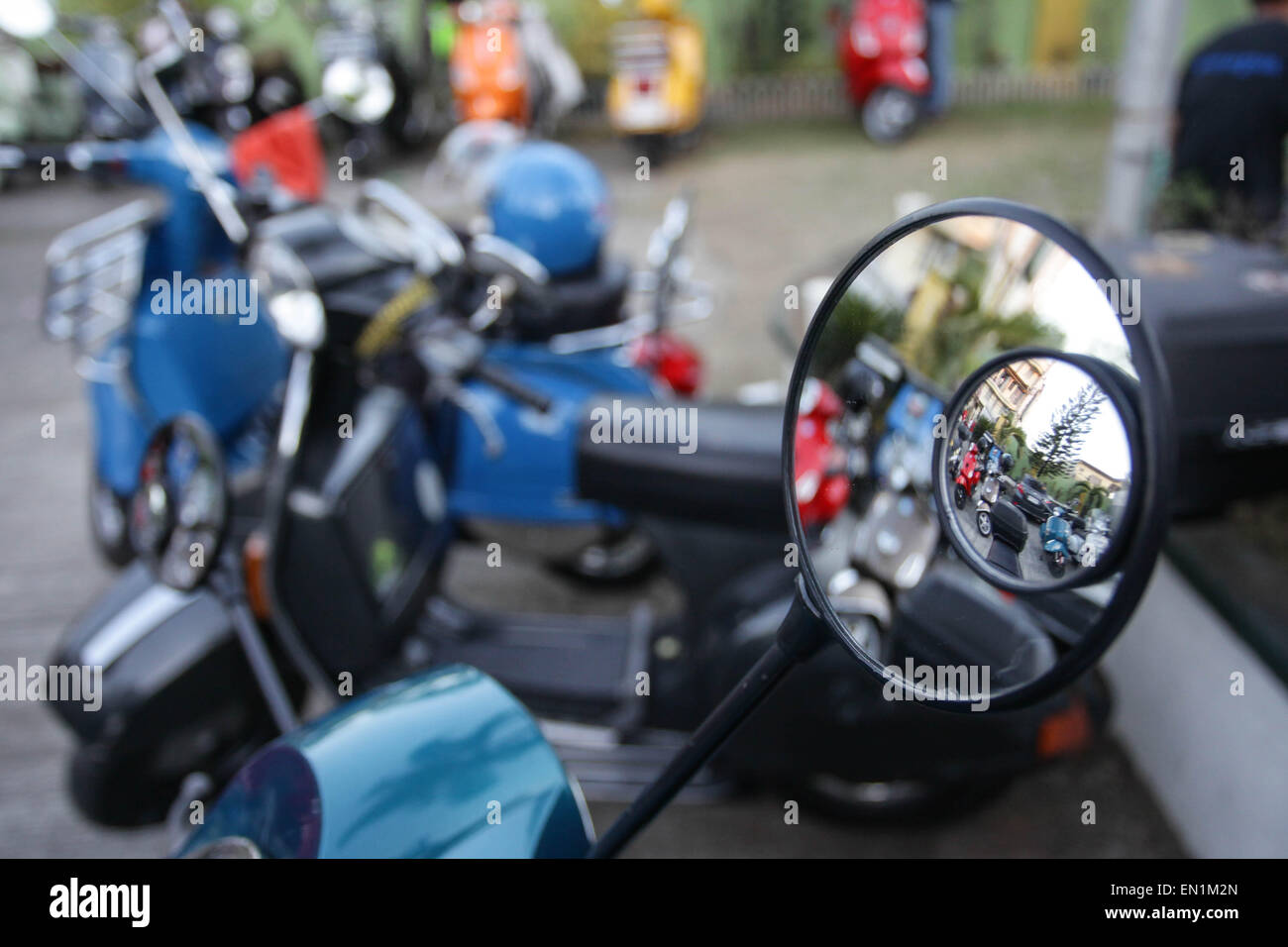 Metro Manila, Philippines. 25th Apr, 2015. European scooters are reflected through a mirror during the 9th Scooter Jamboree in Angono, Rizal on Saturday, the Art Capital of the Philippines annually hosts the Scooter Jamboree, a gathering of European scooter enthusiasts in Metro Manila. © Mark Cristino/Pacific Press/Alamy Live News Stock Photo