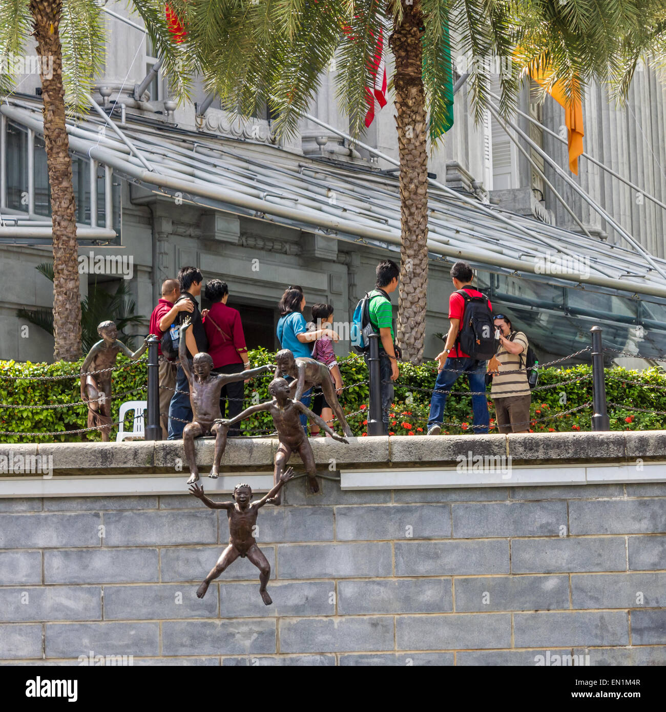 Sculpture, 'First Generation' by artist Chong Fah Cheong, depicts early life in Singapore. Stock Photo