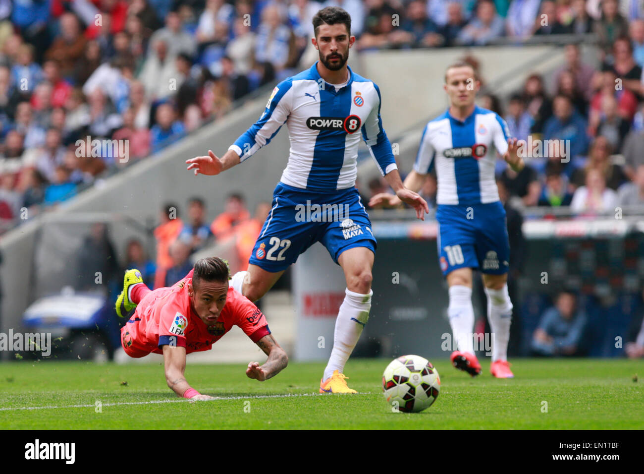 Cornella De Liobregat, Barcelona. 25th Apr, 2015. Barcelona's Neymar (L) is tackled by Espanyol's Lucas Vazquez during the Spanish first division soccer match against Espanyol at Cornella-El Prat Stadium in Cornella del Llobregat, near Barcelona, April 25, 2015. © Pau Barrena/Xinhua/Alamy Live News Stock Photo