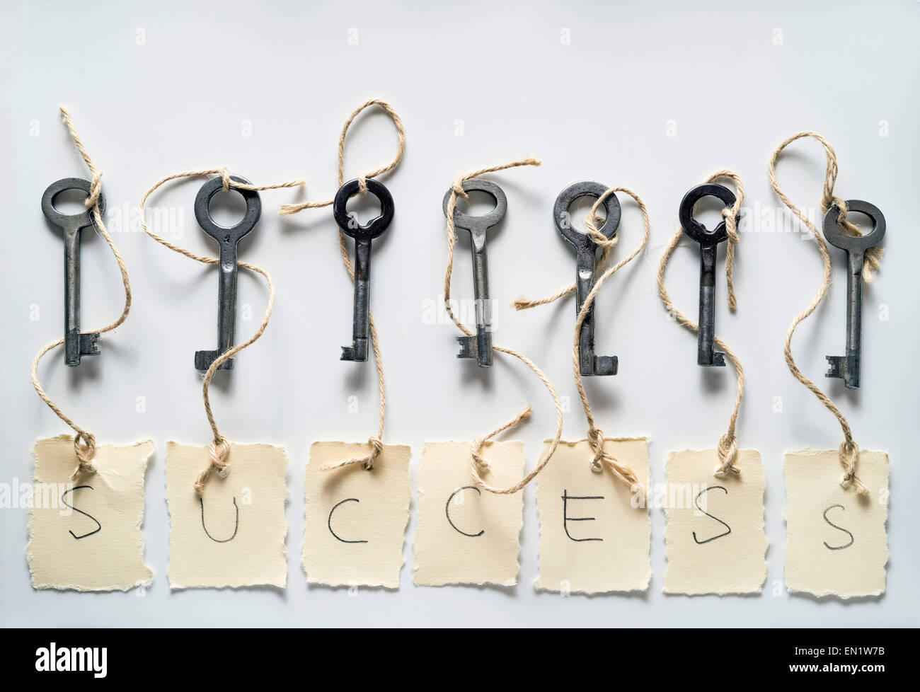 old key to success concept with label or tag Stock Photo