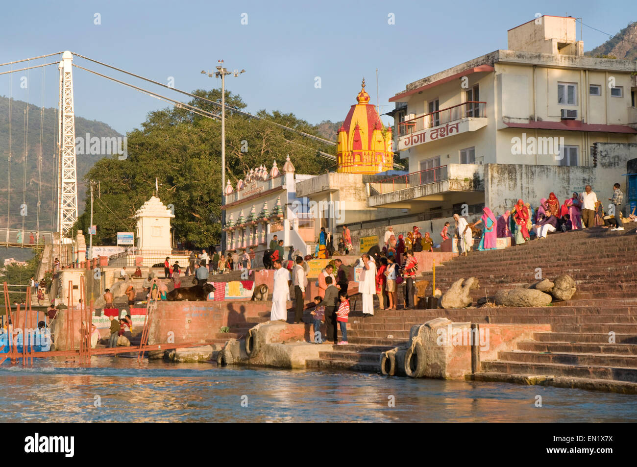 INDIA, Uttarakhand, Rishikesh, people waiting for ferry boat at steps