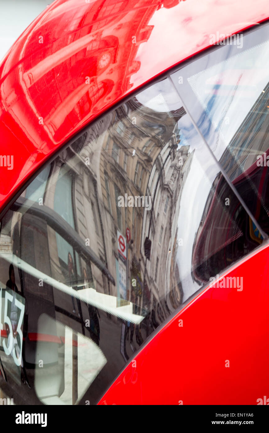bus stop reflected on the back of New Bus for London Stock Photo