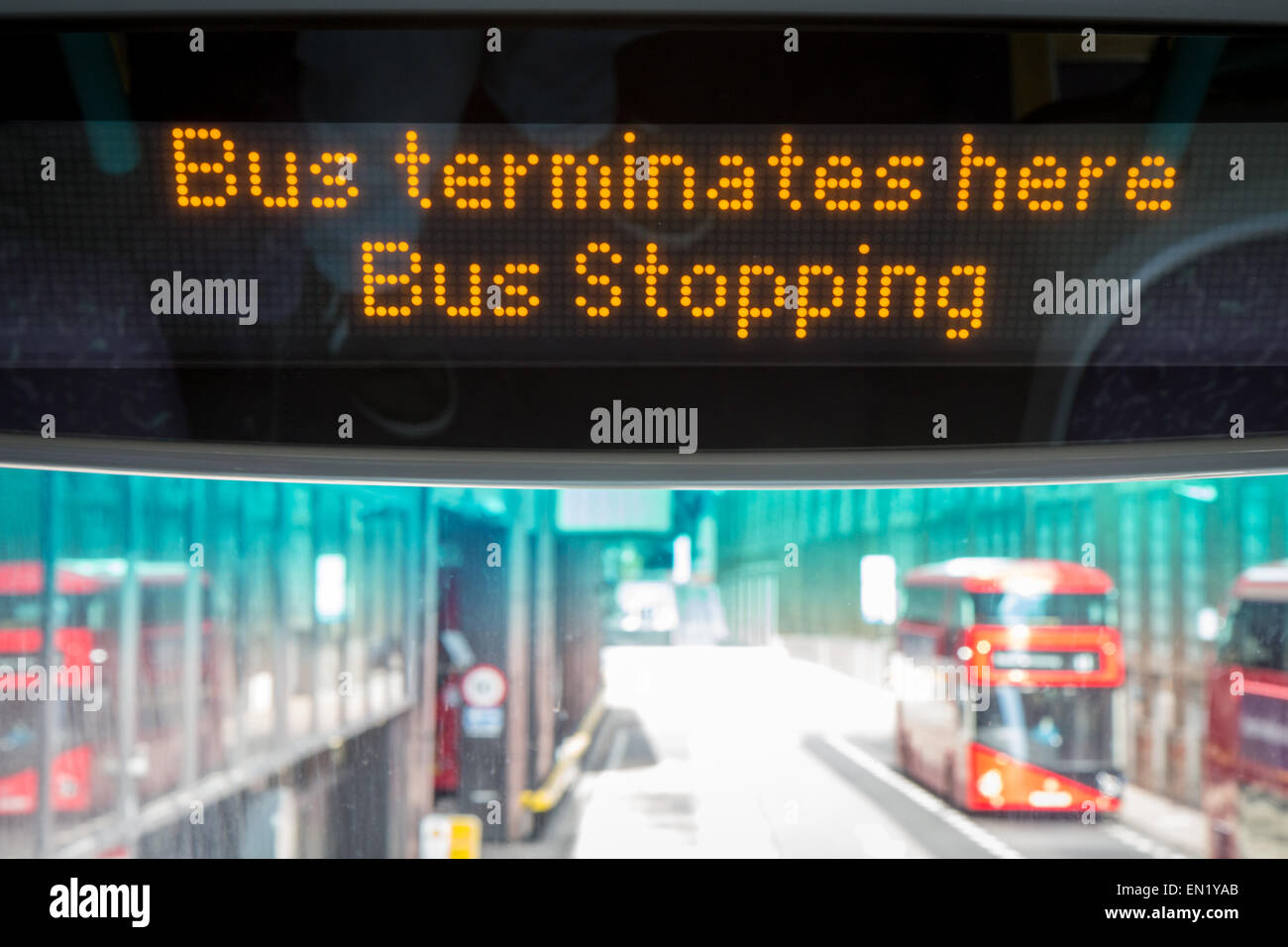 bus terminates here sign on the top deck of a London bus. Stock Photo