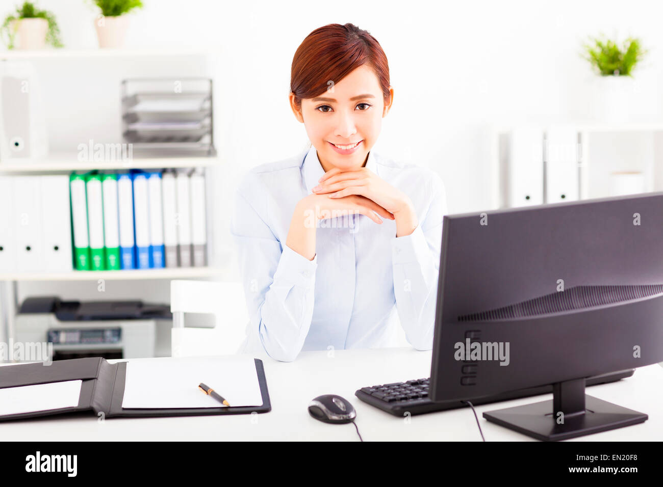 young business woman working in the office Stock Photo - Alamy
