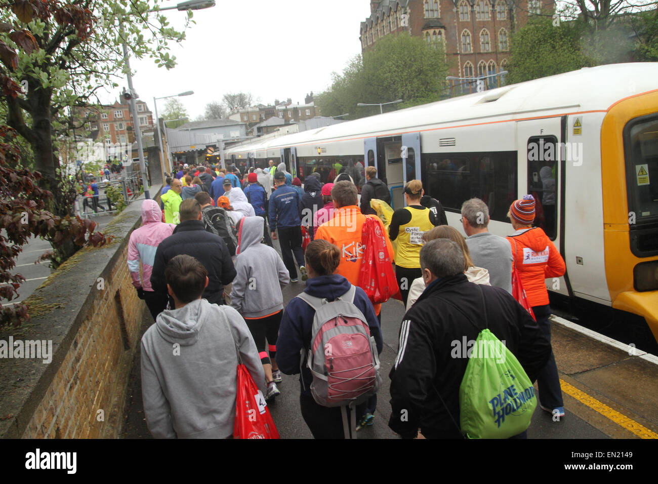 London, UK. 26th April 2015. Hundreds prepare to undertake the 26 mile run of  the annual London Marathon.The 35th London Marathon is sponsored by Virgin Money and holds the Guinness world record as the largest annual fund raising event in the world. Course records are 2:04:29 (2014) Wilson Kipsang and on the women's: 2:15:25 (2003) Paula Radcliffe. Photo: Credit:  david mbiyu/Alamy Live News Stock Photo