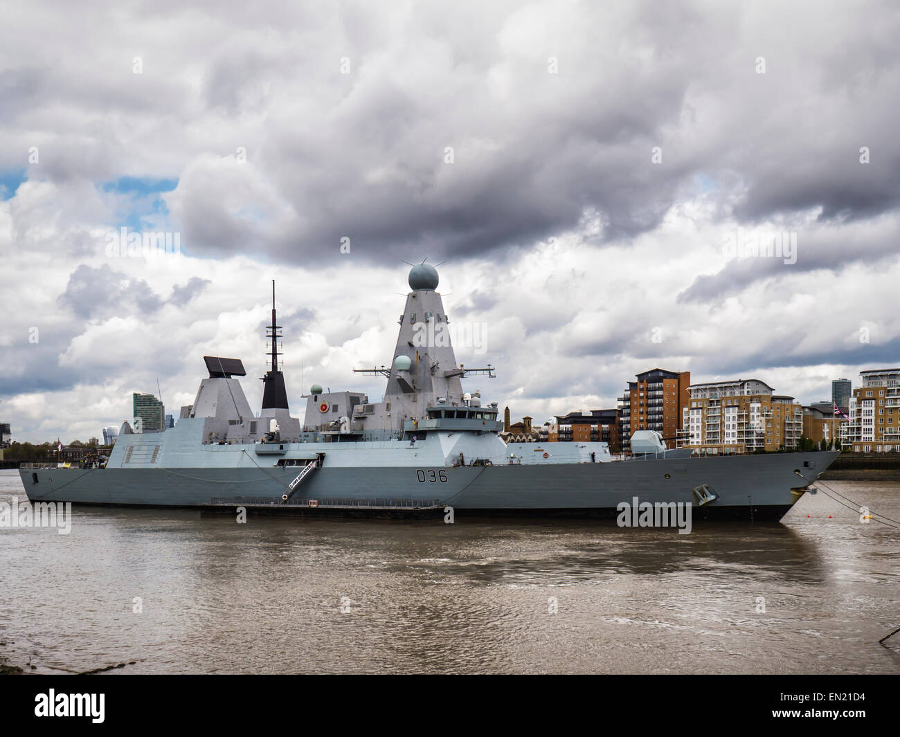 Greenwich, London, UK, 26th April, 2015. The  Royal Navy's HMS Defender is moored in the Thames River at Greenwich. She is the fifth of the Navy's Type 45 destroyers and she returned from her maiden deployment in the Middle East in December 2014. There are public tours this weekend. Credit:  Eden Breitz/Alamy Live News Stock Photo