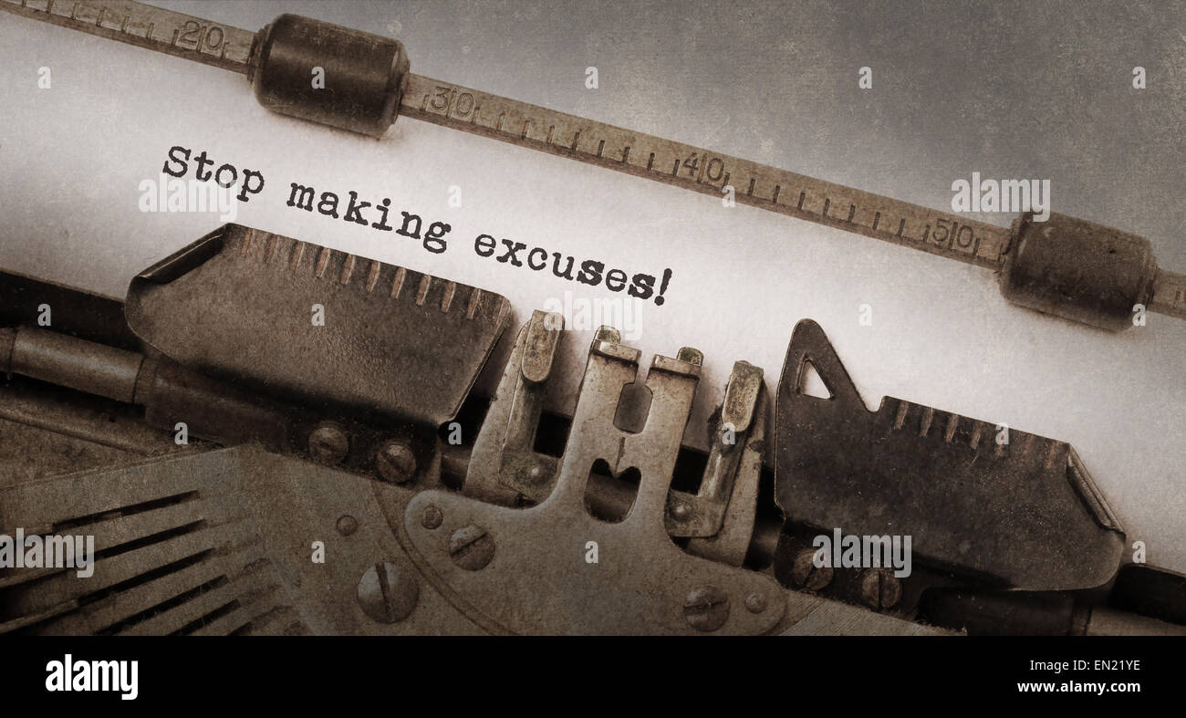 Vintage typewriter, old rusty and used, Stop making excuses Stock Photo