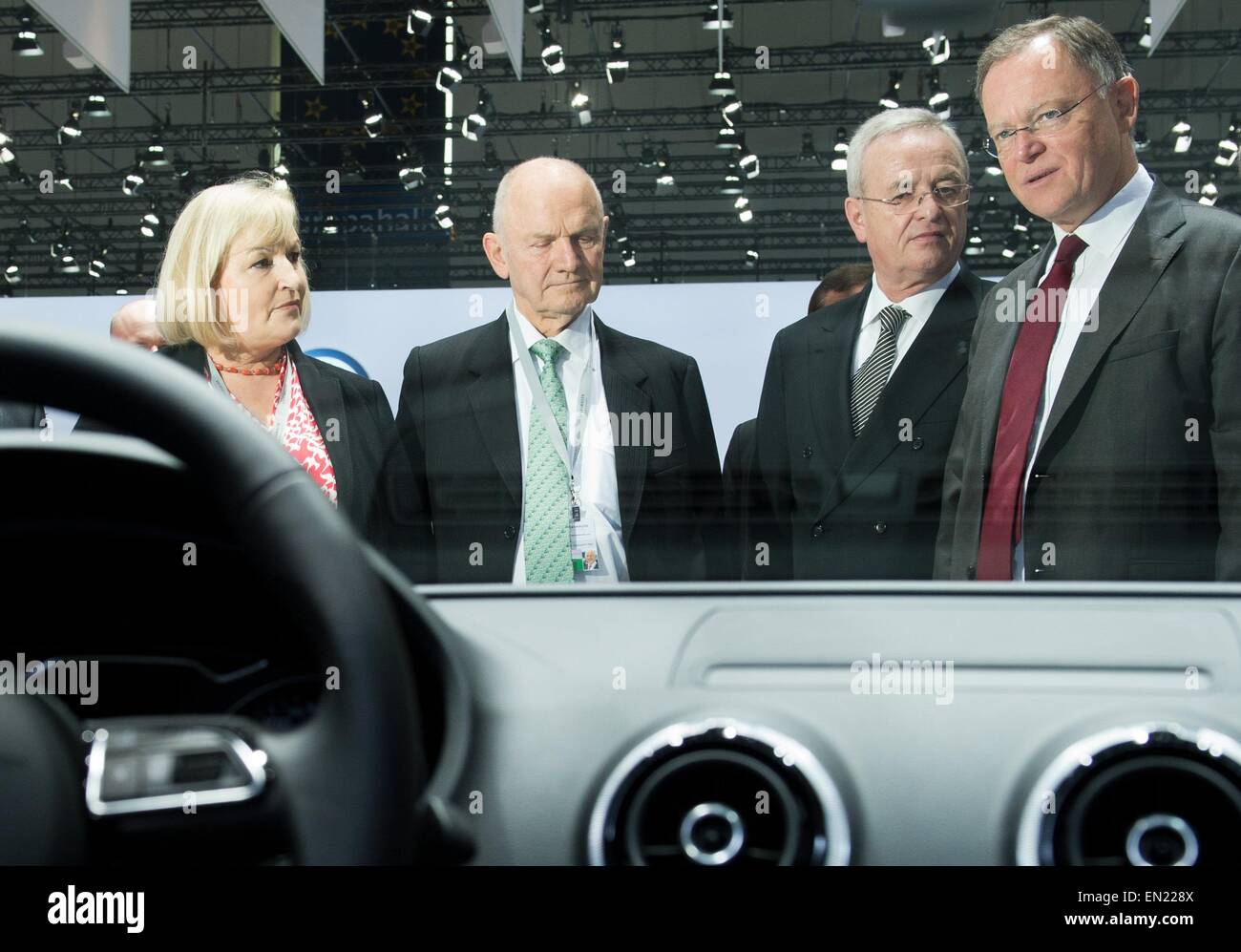 Hanover, Germany. 25th Apr, 2013. Chairman of the supervisory board of Volkswagen AG, Ferdinand Piech (2.f.L.), his wife and supervisory board member, Ursula Piech (L), the CEO of Volkswagen AG Martin Winterkorn (L), and Minister President of Lower Saxony, Stephan Weil, stand together before the start of a Volkswagen AG general meeting in Hanover, Germany, 25 April 2013. Photo: JULIAN STRATENSCHULTE/dpa/Alamy Live News Stock Photo