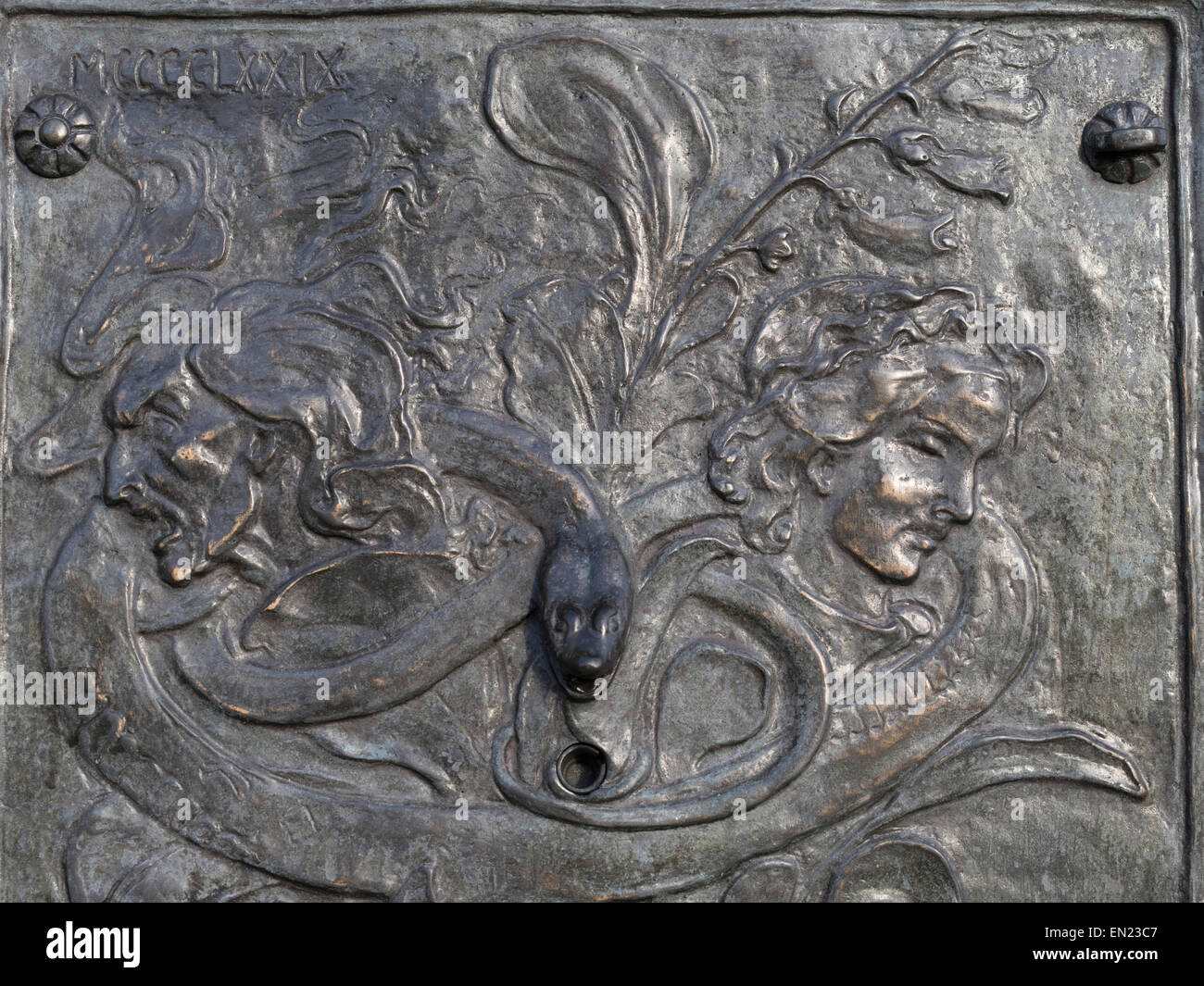 Bronze plaque on Fountain in Edinburgh City near site of witch burning. By John Duncan. Stock Photo