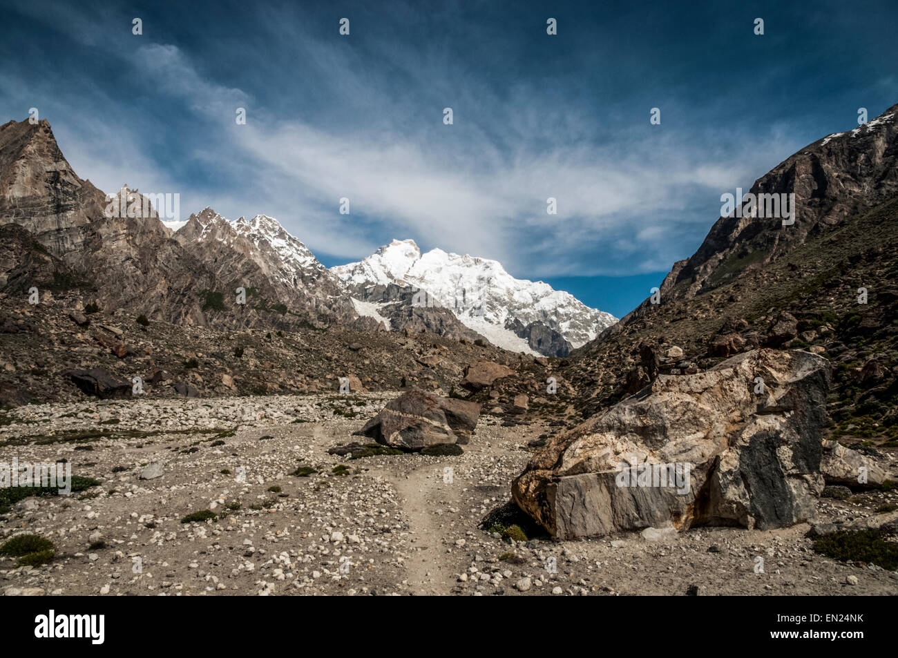 Mountains and Faces; Trekking in the Karakoram Mountains Stock Photo