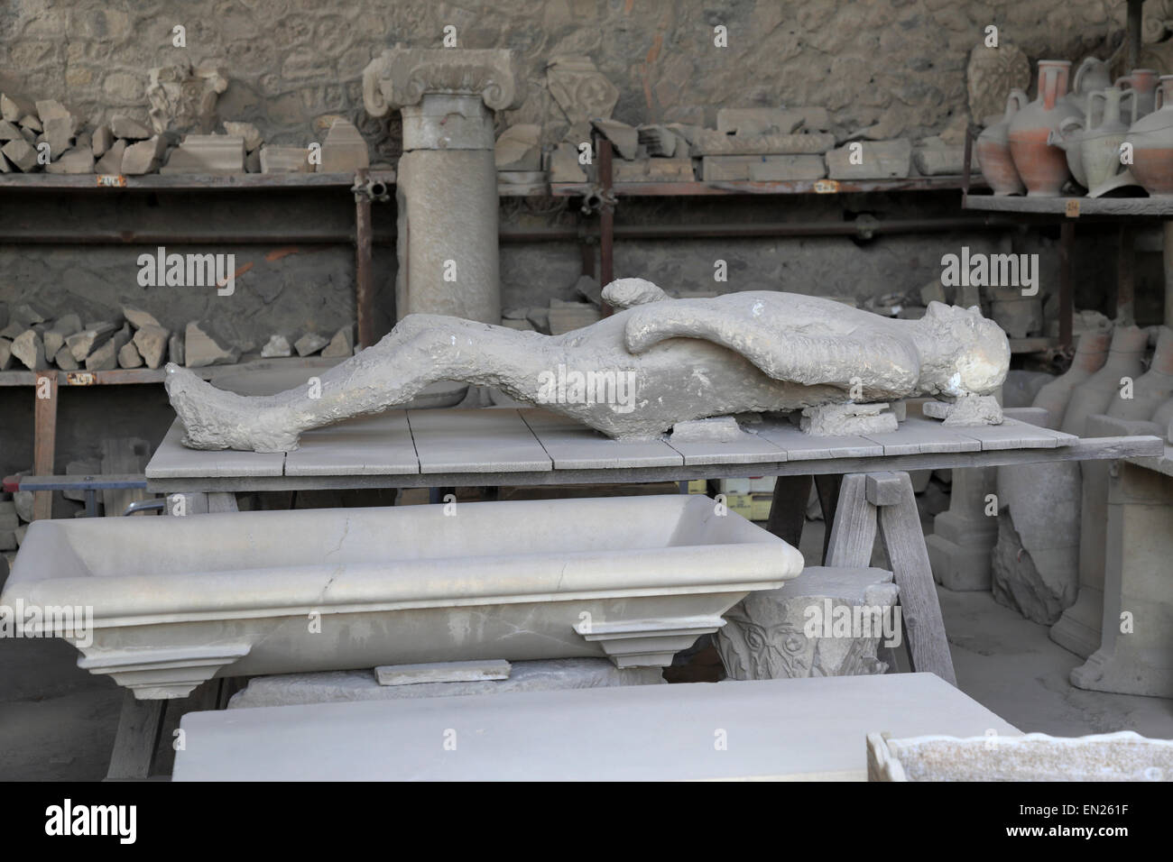 Supine body plaster cast in the Granary, Pompeii, Italy. Stock Photo