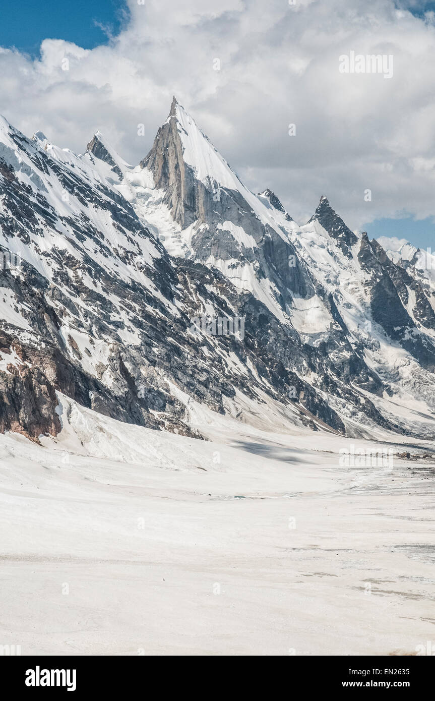 Mountains and Faces; Trekking in the Karakoram Mountains Stock Photo