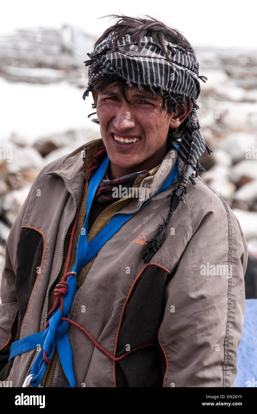 Mountains and Faces; Trekking in the Karakoram Mountains Stock Photo