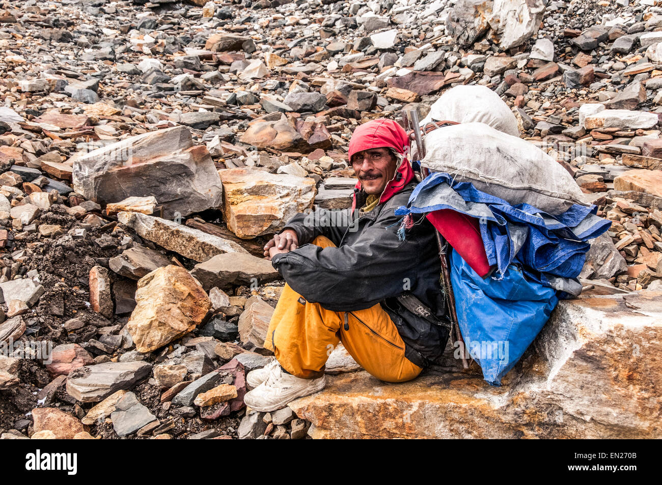 Mountains and Faces; Trekking in the Karakoram Mountains Stock Photo