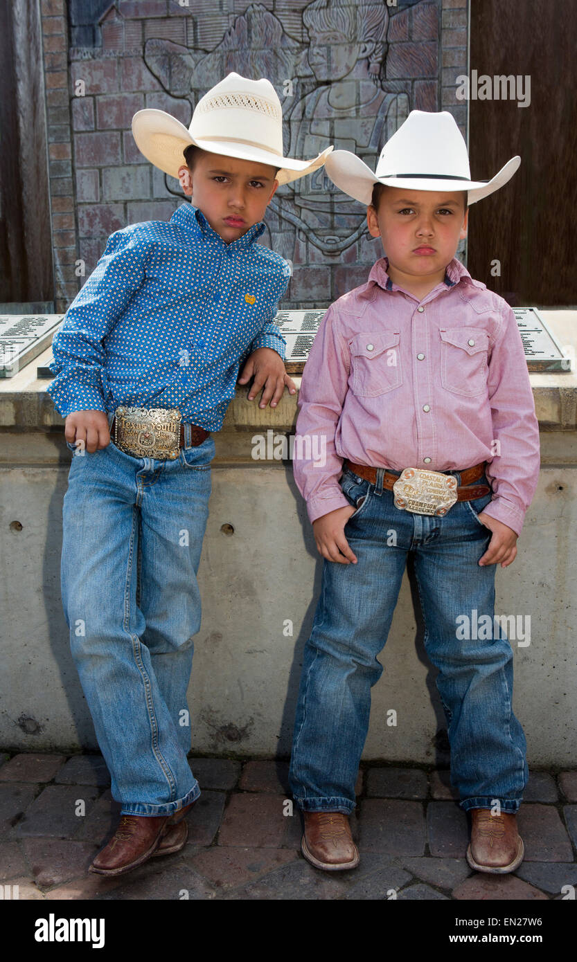 Young Boy In Cowboy Boots High 