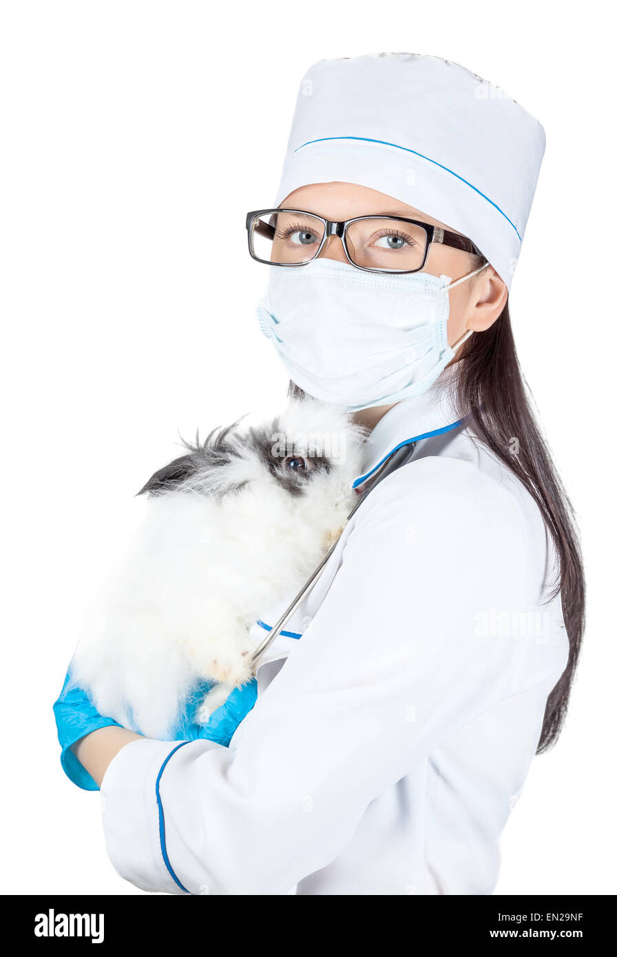 portrait of a doctor with a decorative rabbit in hands on a white background Stock Photo