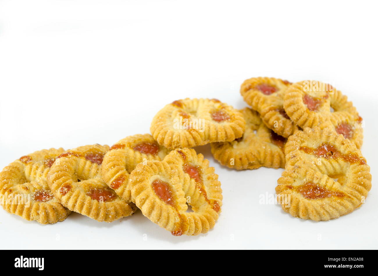 Bunch of tea cookies with strawberry cream isolated Stock Photo Alamy